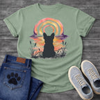 French Bulldog t-shirt with Frenchie silhouette seen from behind in ink wash cattails and grass, full watercolor sunset in coral gold and deep purple behind, loose concentric brushstroke rainbow arch above, no text painterly watercolor art graphic