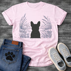 French Bulldog t-shirt with Frenchie silhouette seen from behind centered in a detailed navy line art botanical scene, cattails and tall reeds on either side, still water and distant shoreline ahead, no text refined nature illustration graphic
