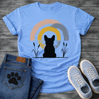 French Bulldog t-shirt with Frenchie silhouette seen from behind sitting between cattail reeds, overlapping brushstroke circles in blush pink gold and slate blue behind with water ripple detail, minimal ink ground line, no text soft zen art graphic
