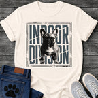French Bulldog t-shirt with halftone Frenchie standing full body facing forward, oversized condensed slate blue text reading Indoor Division behind the portrait, diagonal slash detail, heavy distressed double border frame, black and slate two-color graphic
