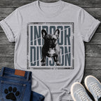French Bulldog t-shirt with halftone Frenchie standing full body facing forward, oversized condensed slate blue text reading Indoor Division behind the portrait, diagonal slash detail, heavy distressed double border frame, black and slate two-color graphic

