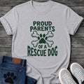 Proud Parents Of A Rescue Dog t shirt design in dark green text with a paw print and crossbones icon