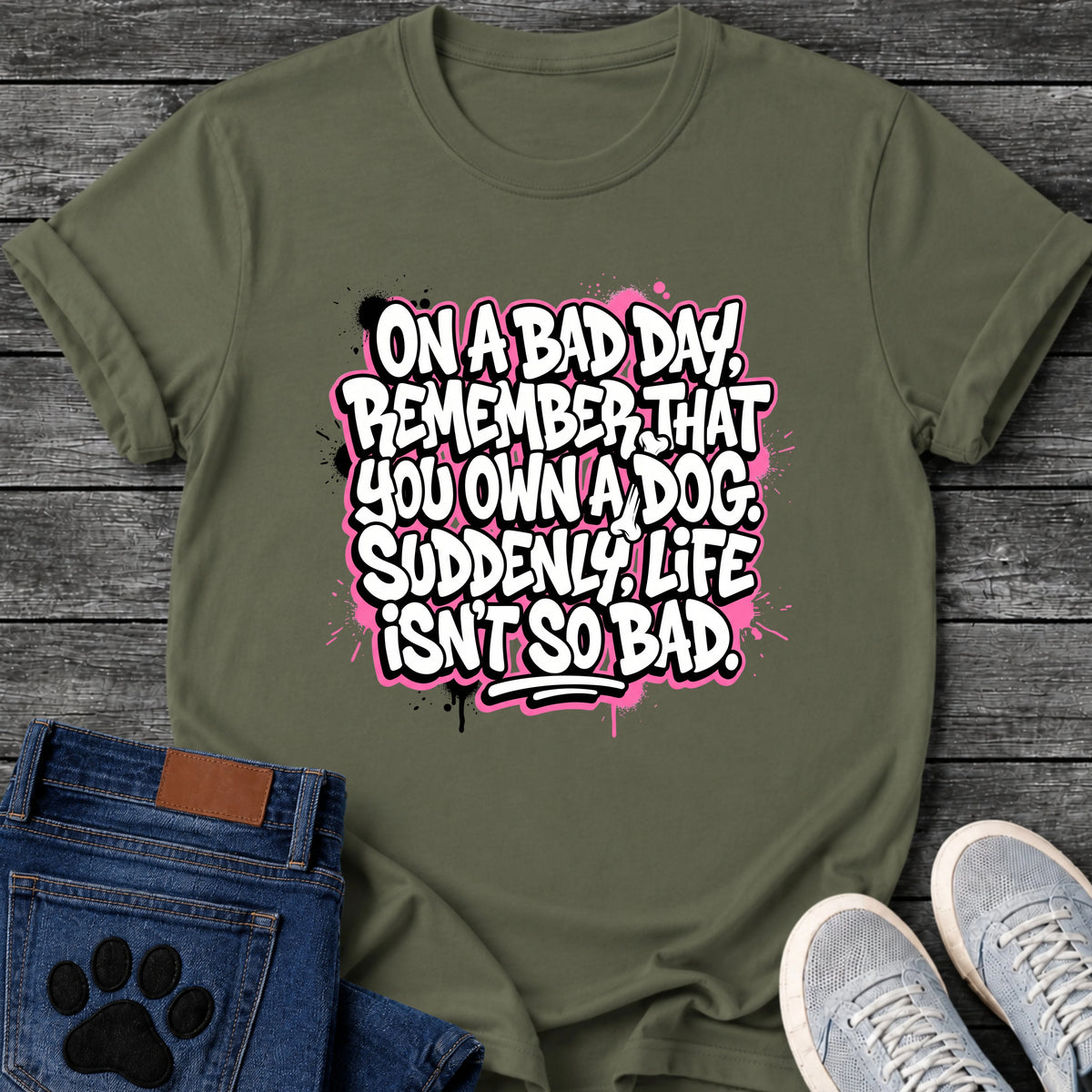 On A Bad Day Remember That You Own A Dog Suddenly Life Isnt So Bad t shirt design in graffiti sticker style white and black lettering with pink paint splatter background