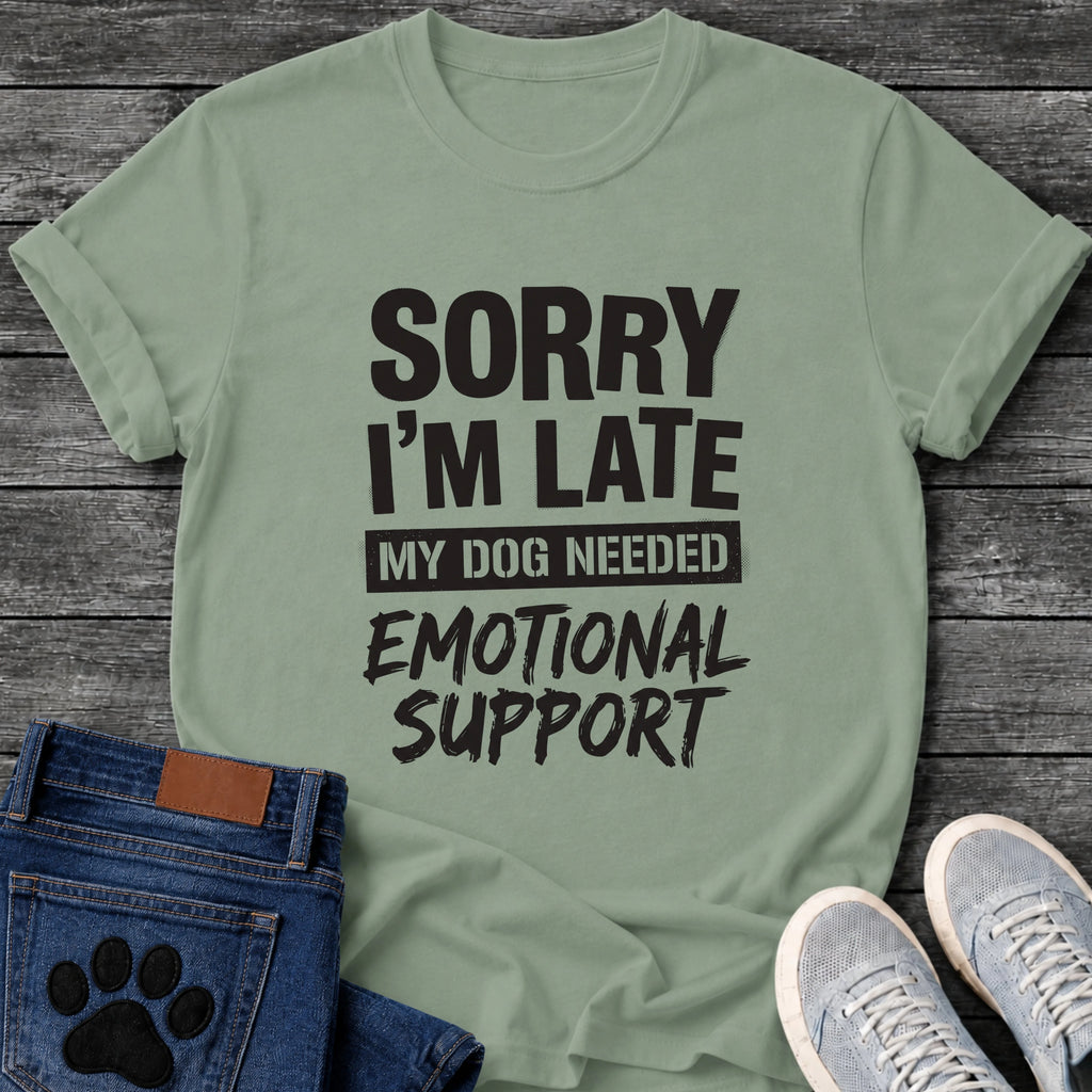 Bold mixed type graphic tee design reading "Sorry I'm Late, My Dog Needed Emotional Support," with a stamped highlight bar behind the middle line.
