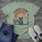 French Bulldog t-shirt with stencil arched text reading Street Punk above a spray paint scene of a Frenchie sitting on a park bench beside a street lamp, zigzag spray paint rainbow in red terracotta and gold with drips, urban street art graphic